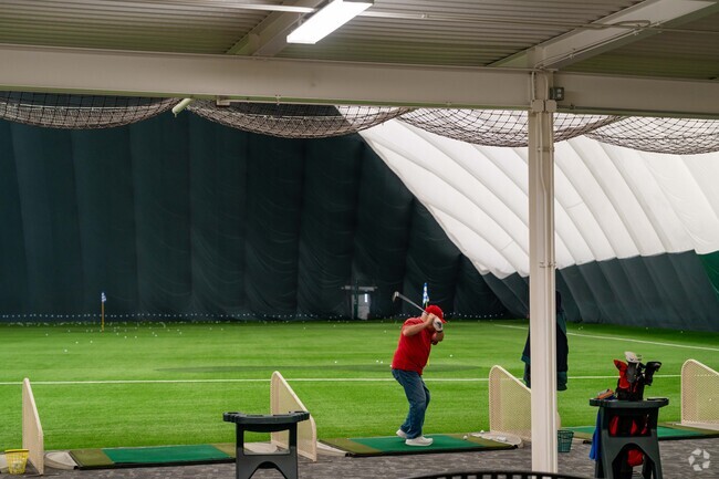 There is an indoor driving range close to T Edison School.