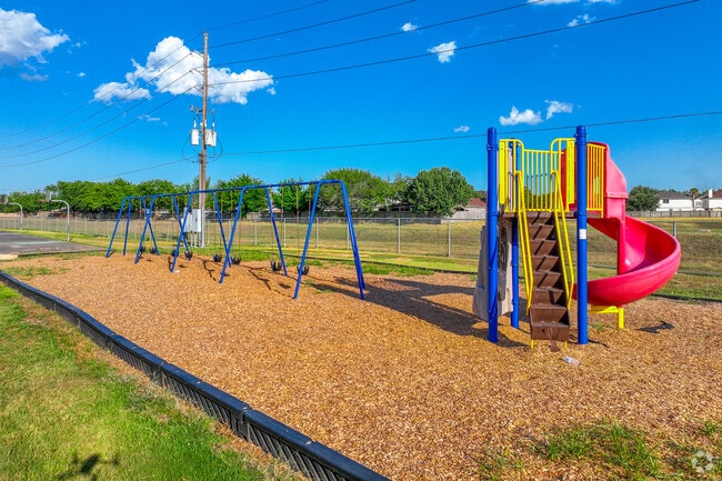 Students enjoy playing on the swings at Rees Elementary School in Briair Village TX.