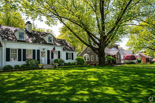 Many homes in Independence rest beneath tree canopies.