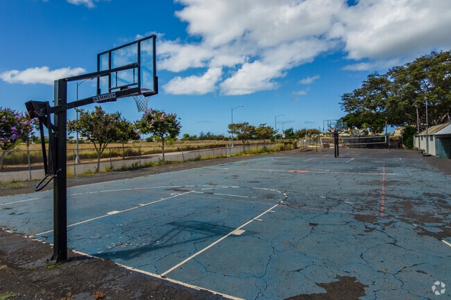 An outdoor basketball and volleyball court promotes student health at Lanakila Baptist School.