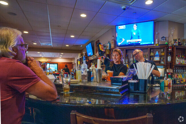 Get to know the friendly and funny bartenders at Walt's Other Pub near Dover Estates.