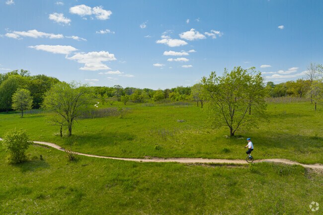 A unicyclist on the trail at Murphy-Hanrehan Park.