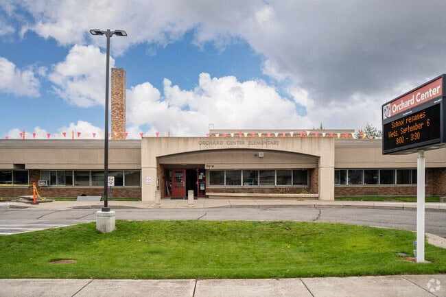 Orchard Center Elementary is located in a residential neighborhood, just north of Trent Avenue.