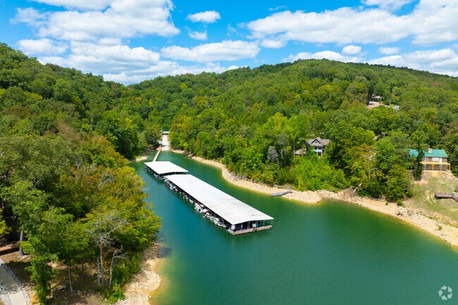 Boats dock at Norris Lake marinas across Chuck Swan.