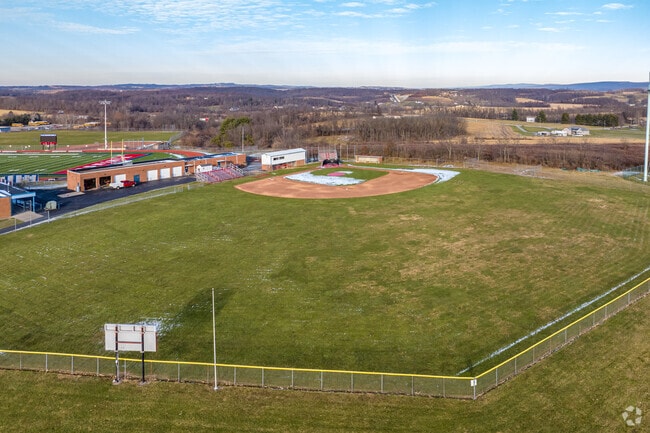 Mount Pleasant Area High School drives in the winning run.