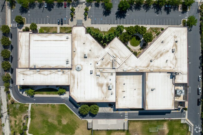 A bird’s eye view shows V shaped cutouts with green space at Clayton Middle School.