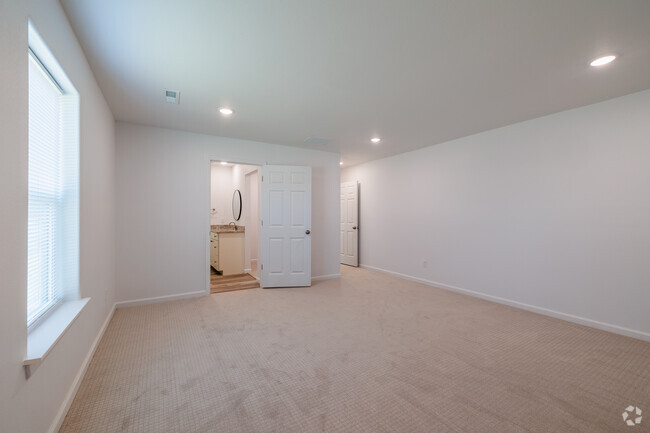 3BR, 2BA - 1,800SF - Primary Bedroom