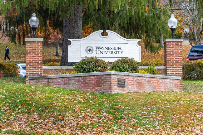 Waynesburg University sign marks the entrance to the historic campus.