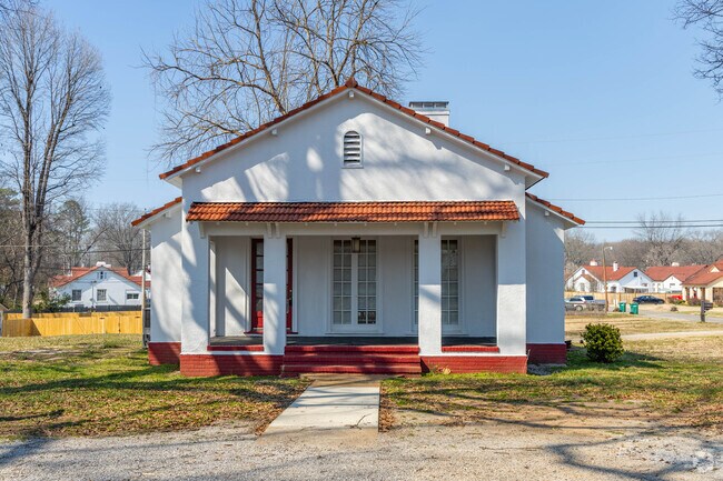 Small historic bungalows with red tiled roofs live on the West side of Sheffield.