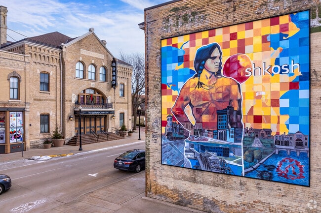 Colorful murals and The Grand Opra House are found in Downtown Oshkosh.