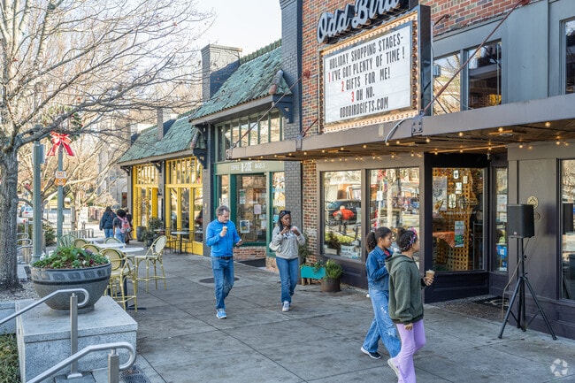 Locals enjoy the window shopping in Decatur Square near College Heights.