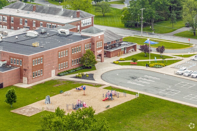 Playgrounds, parking, and classic architecture—Whitehouse School balances modern life with small-town charm.