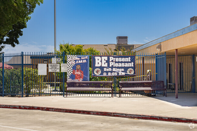 A large banner outside the entrance to Pleasant Elementary School encourages good character.