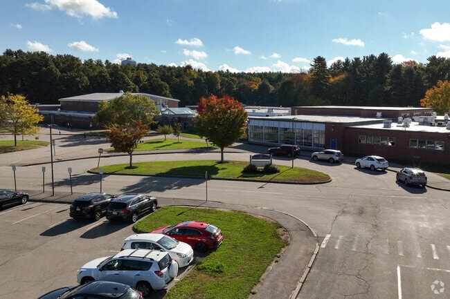 Thomas Blake Middle School is surrounded by dense woods.