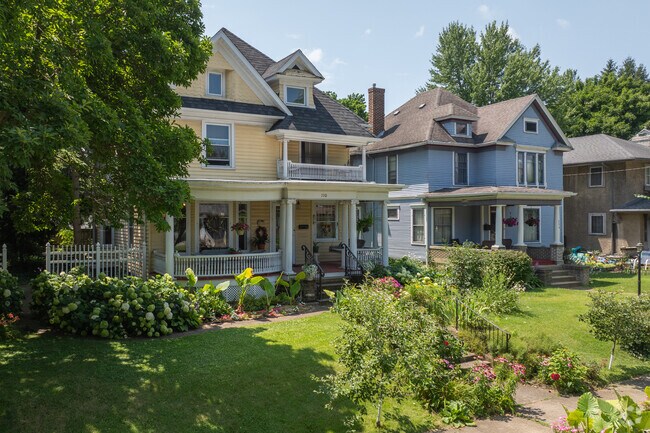 Front yard gardens and mature tree lined streets are common in North Shore Triangle.