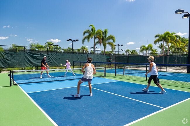Arrowhead-Island Walk residents play pickleball with friends on the well-appointed courts.
