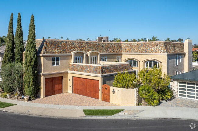 Dover Shores Traditional classic upscale contemporary designed homes blend coastal elements for a timeless streetscape.