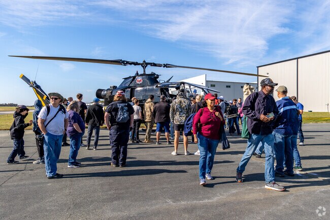 Military pilots answer any questions about their aircraft at the Warbirds Over Monroe.