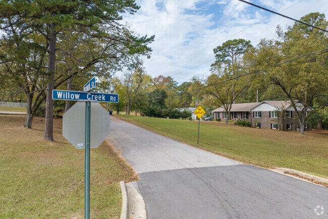 Willow Creek streets boast houses with lush green lots and tall mature shade trees.