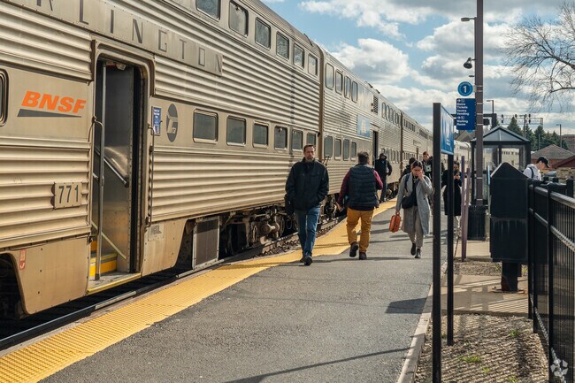 Commuters at Downtown Aurora's Train station take the Metra line to downtown Chicago.