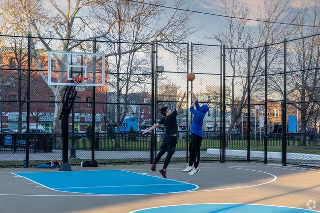 Come for basketball game with friends in Veterans Plaza in Harrison, NJ.