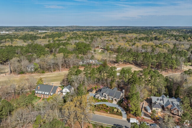 Spacious homes in The Oaks border the Chapel Hill Country Club's 18-hole course.