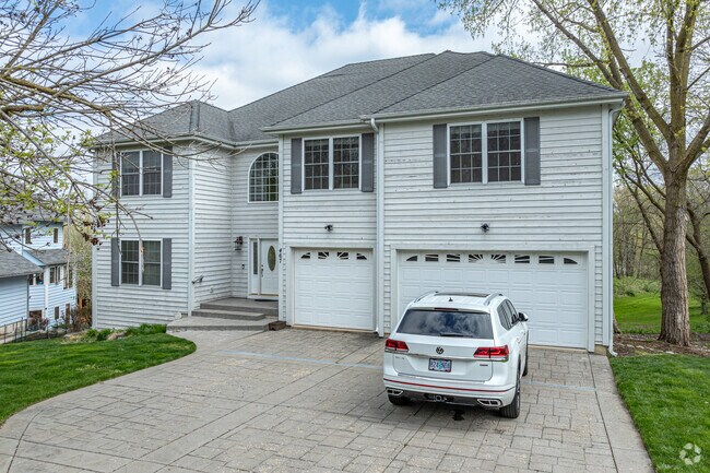 Whalon Lake features many newer traditional homes with attached garages.