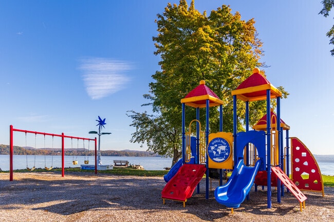 At River Front Park, families can enjoy the colorful playground while taking in scenic river views.