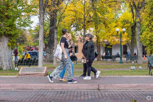 People from all walks of life share the Santa Fe Plaza in Historic Saint Catherine's.