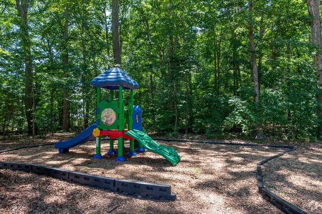 Playground shaded by the trees at Randolph Elementary School.