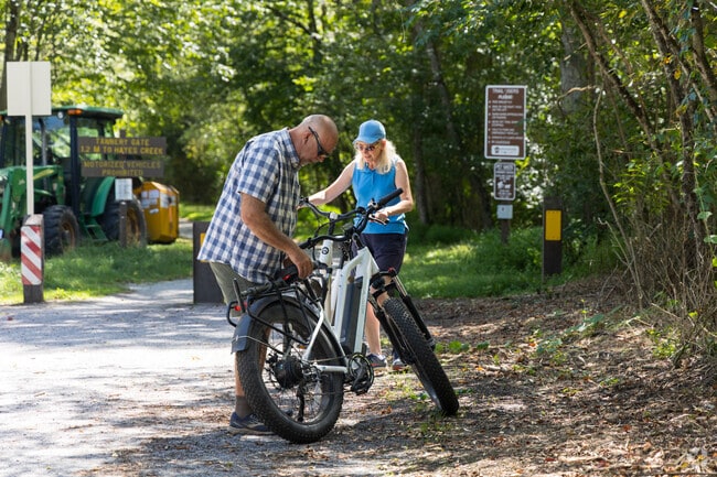Foster residents enjoy biking on the scenic D&L Trail, which winds through wooded paths.