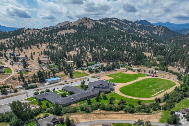 Clancy Elementary School offers a serene learning environment with beautiful mountain views.