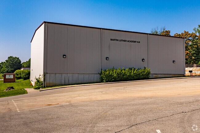 Martin Luther Academy building with parking lot.