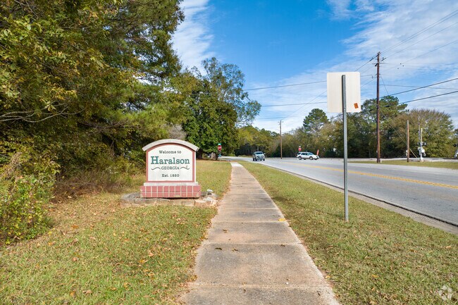 Haralson is a deep country neighborhood with densely wooded roads and spread out homes.
