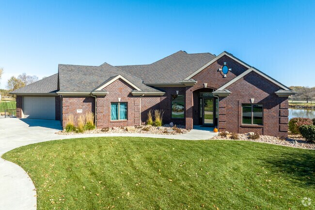 Those large homes often have extensive brick and stone work, along with lakeside views.