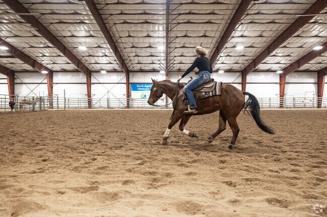 A woman rides her horse at the Agricultural Heritage Center in West Kaysville.
