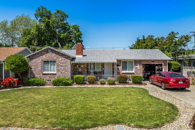 You will find this all-brick Traditional home with a single car garage in Old West Sacramento.