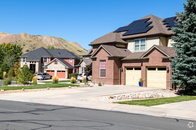 Large brick homes are common in the Castle Highlands neighborhood.