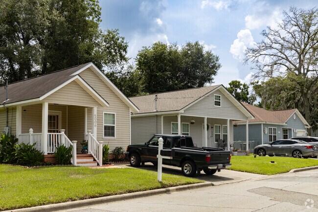 New construction homes in Tatemville feature compact designs with front porches.