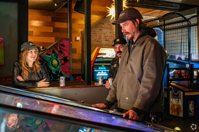 Sugarhill residents can enjoy the nightlife in nearby downtown at locations such as the Arcade Bar.