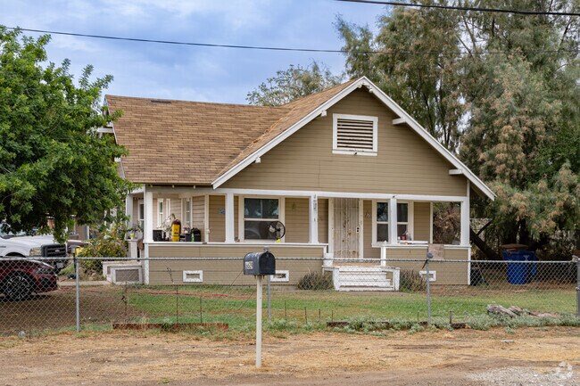 A well restored early 20th century Craftsman style home in Olive Drive Area.