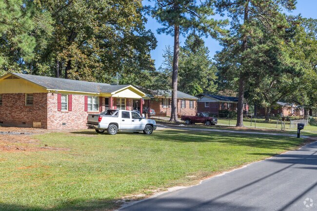 Many Glendale Acres homes have fenced yards or a line of trees and bushes separating properties.