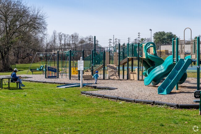 Children enjoy the Maple Street Park playground on beautiful days in East End South.