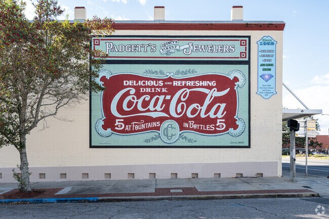 The famous Coca-Cola mural at Padgett's Jewelers welcomes you to Quincy's Historic Downtown.