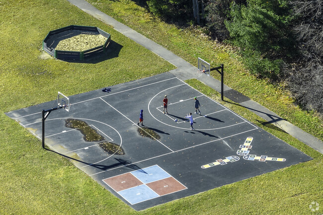 Students play on the basketball court at Mabelle M. Burrell Elementary School in Foxborough, MA.