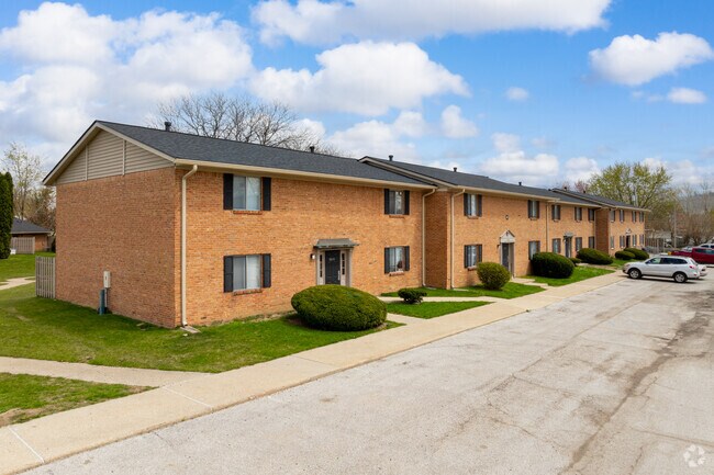 Brick Colonial-inspired apartment complexes make up Cambridge Estates west and north sides.