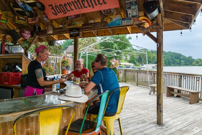 Enjoy an afternoon lunch and cocktail at the historic White Lake Inn on the lake.