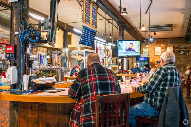 Locals love to sit at the bar at Ramunto's Brick Oven Pizza near South End.