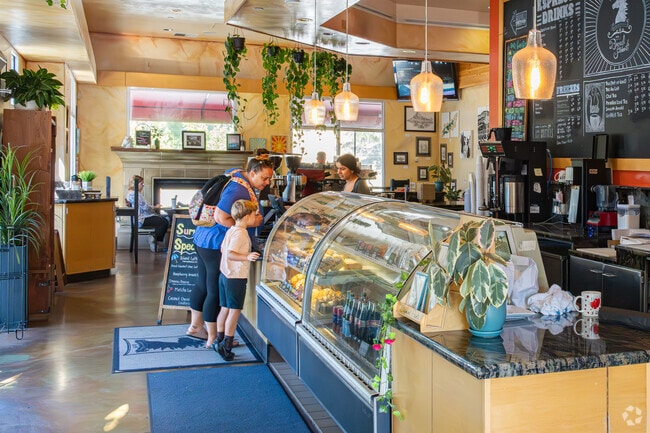 A Margarita mother and her son pick out a morning pastry at Blackhorse Espresso & Bakery.