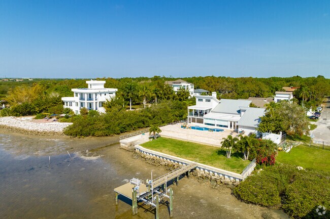 Two-story homes with private boat docks lie in Town 'n' Country.